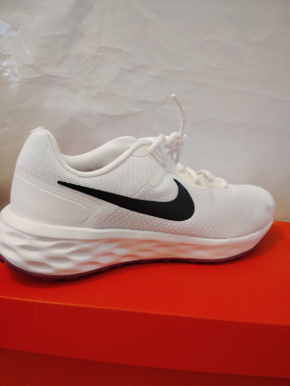 Nike Women's' White Running Shoe with Black Swoosh